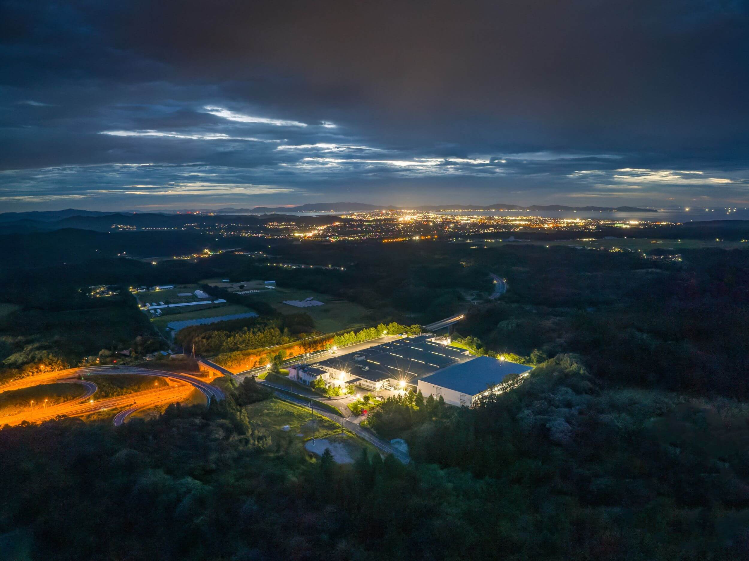 Aerial view of a data center after sunset